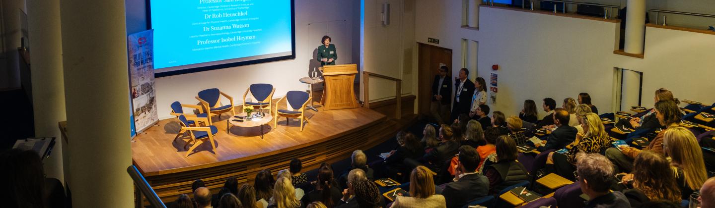 Delegates at the Cambridge Children's Hospital conference with Dame Mary Archer and Dame Rachel de Souza, centre
